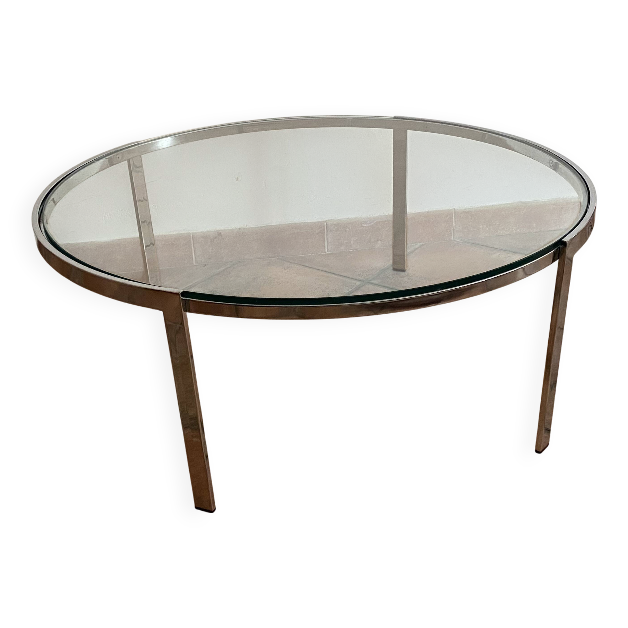 Space Age coffee table. 1970s. Chrome-plated steel and glass.
