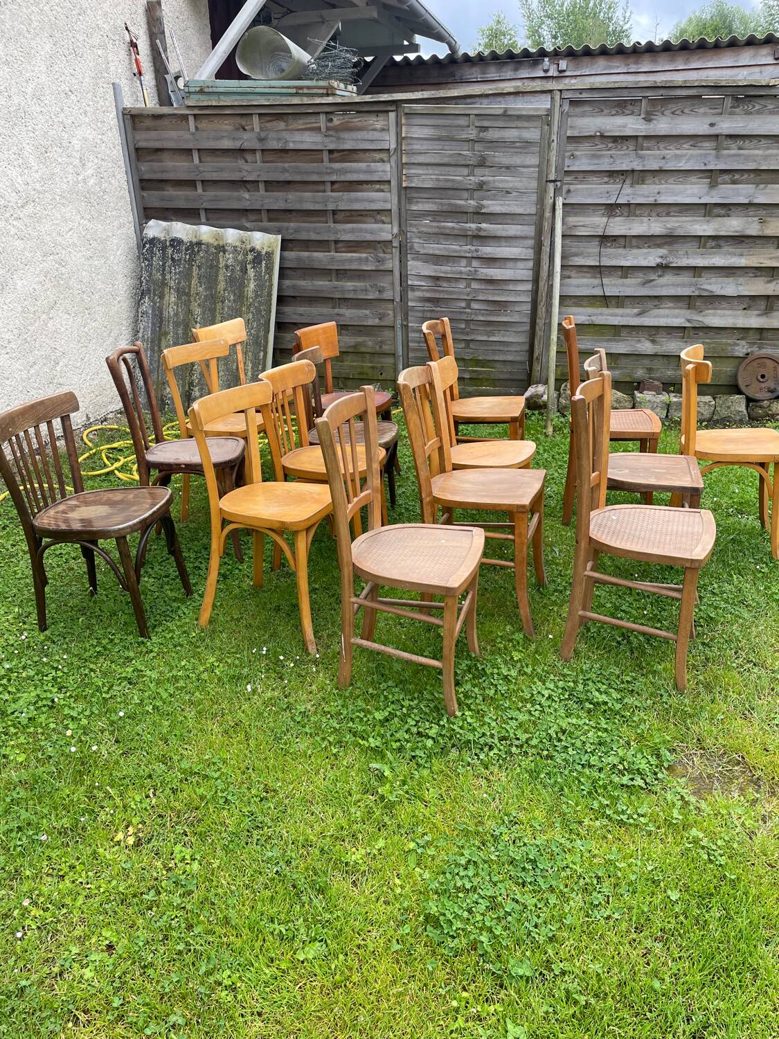 Lot of 16 mismatched bistro chairs