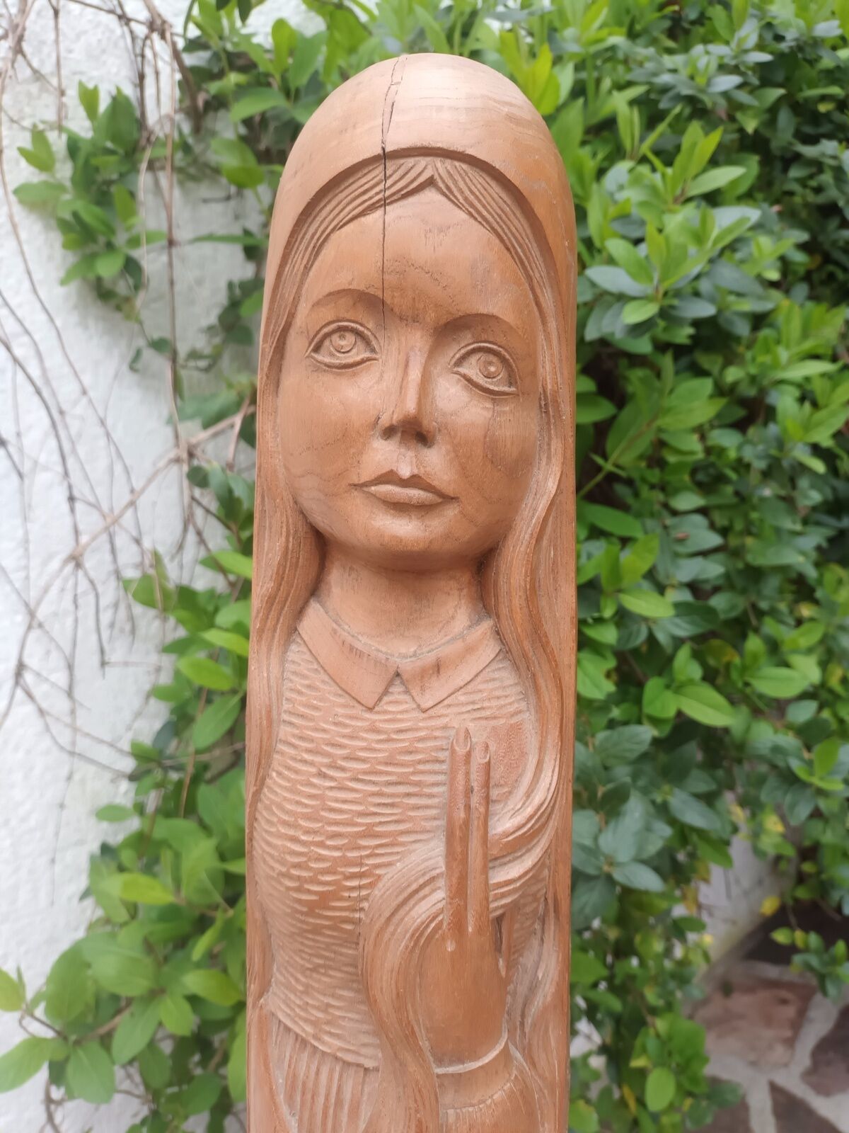 Young woman sculpture by Ray Boterf