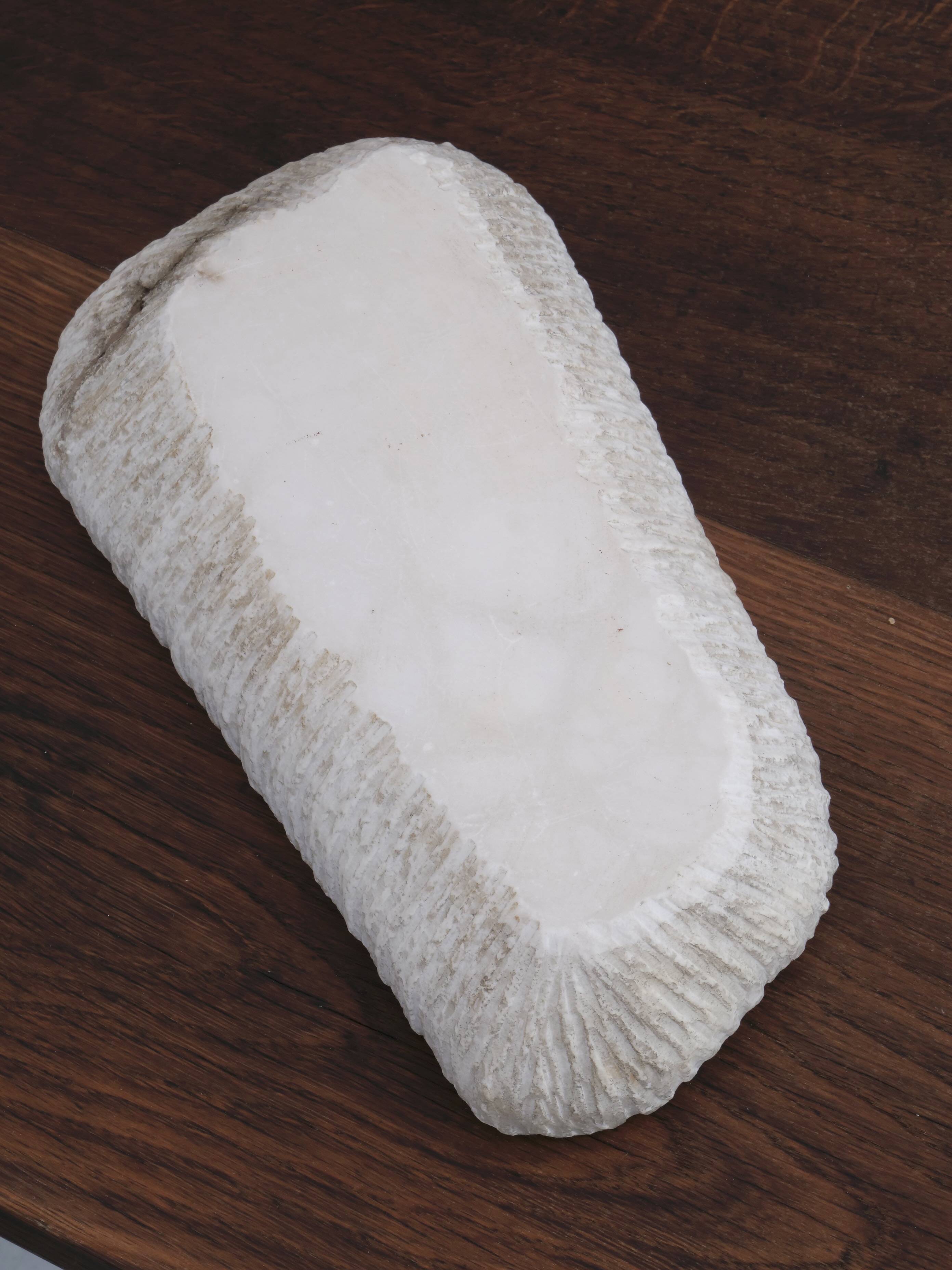 Brutalist free-form alabaster emptier