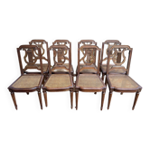 Suite de 8 chaises de style Louis XVI en cannage