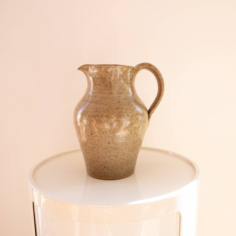 Stoneware carafe signed CA on handle