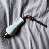 Brass door handle and Limoge porcelain