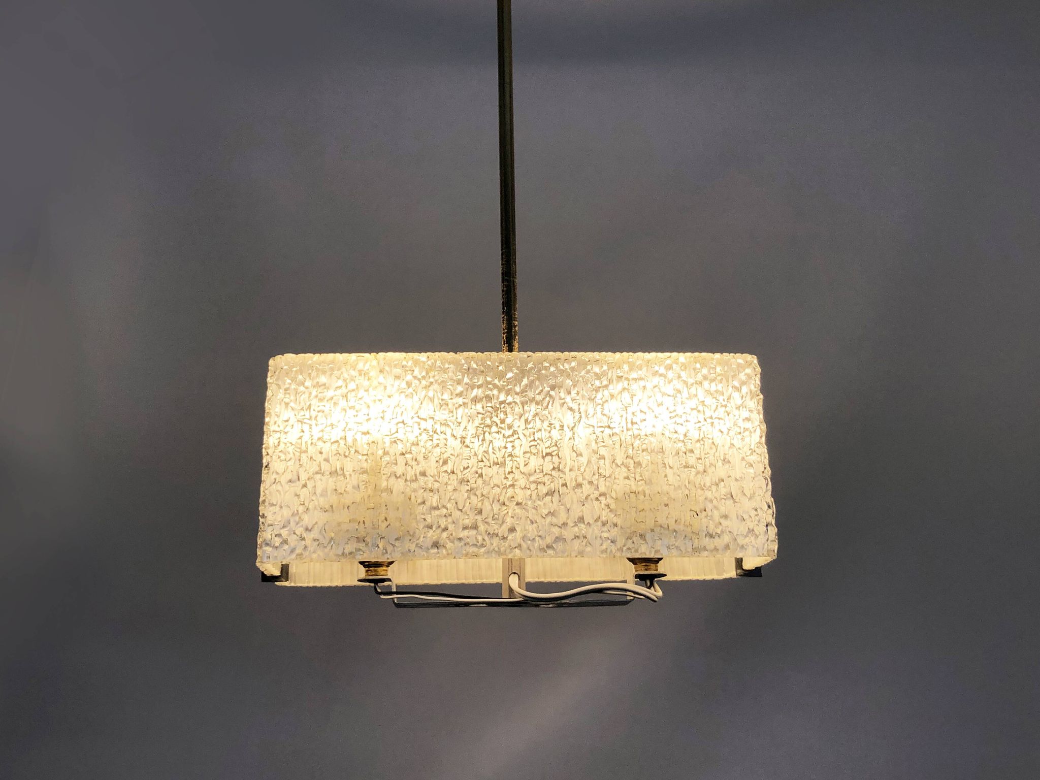 Modernist brass and perspex chandelier Maison Arlus France from the 1950s