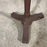 Bistro table with a cast iron base