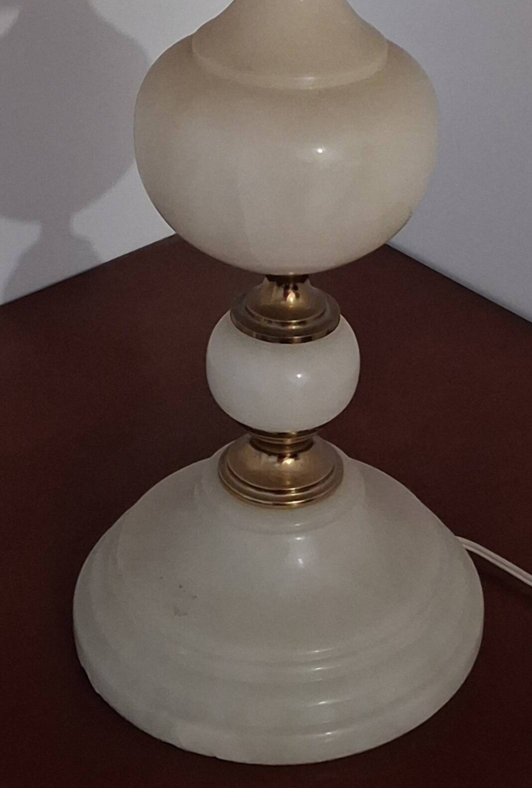 Lamp with an onyx and brass base.