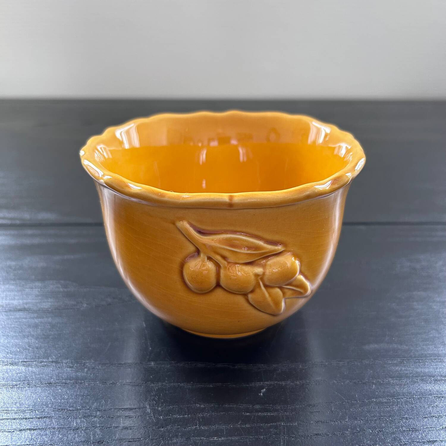 Scalloped bowl with olive decoration