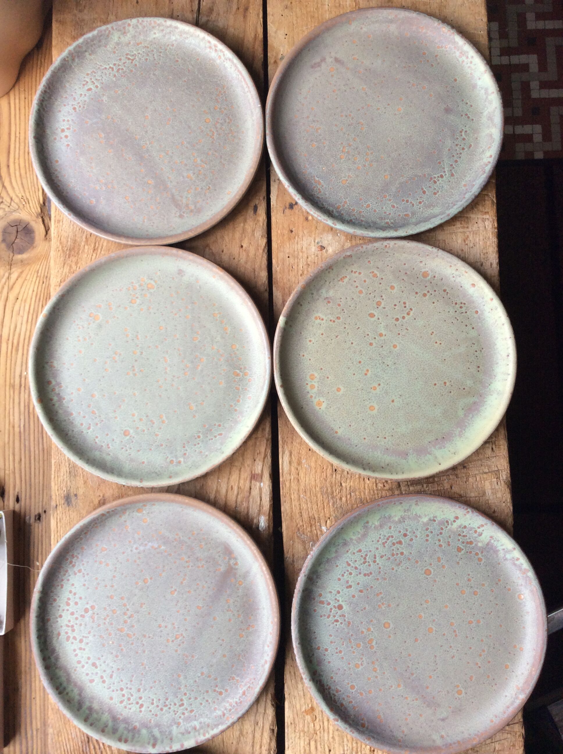 Set of 12 large and 11 small sandstone plates