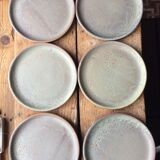 Set of 12 large and 11 small sandstone plates