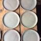 Set of 12 large and 11 small sandstone plates