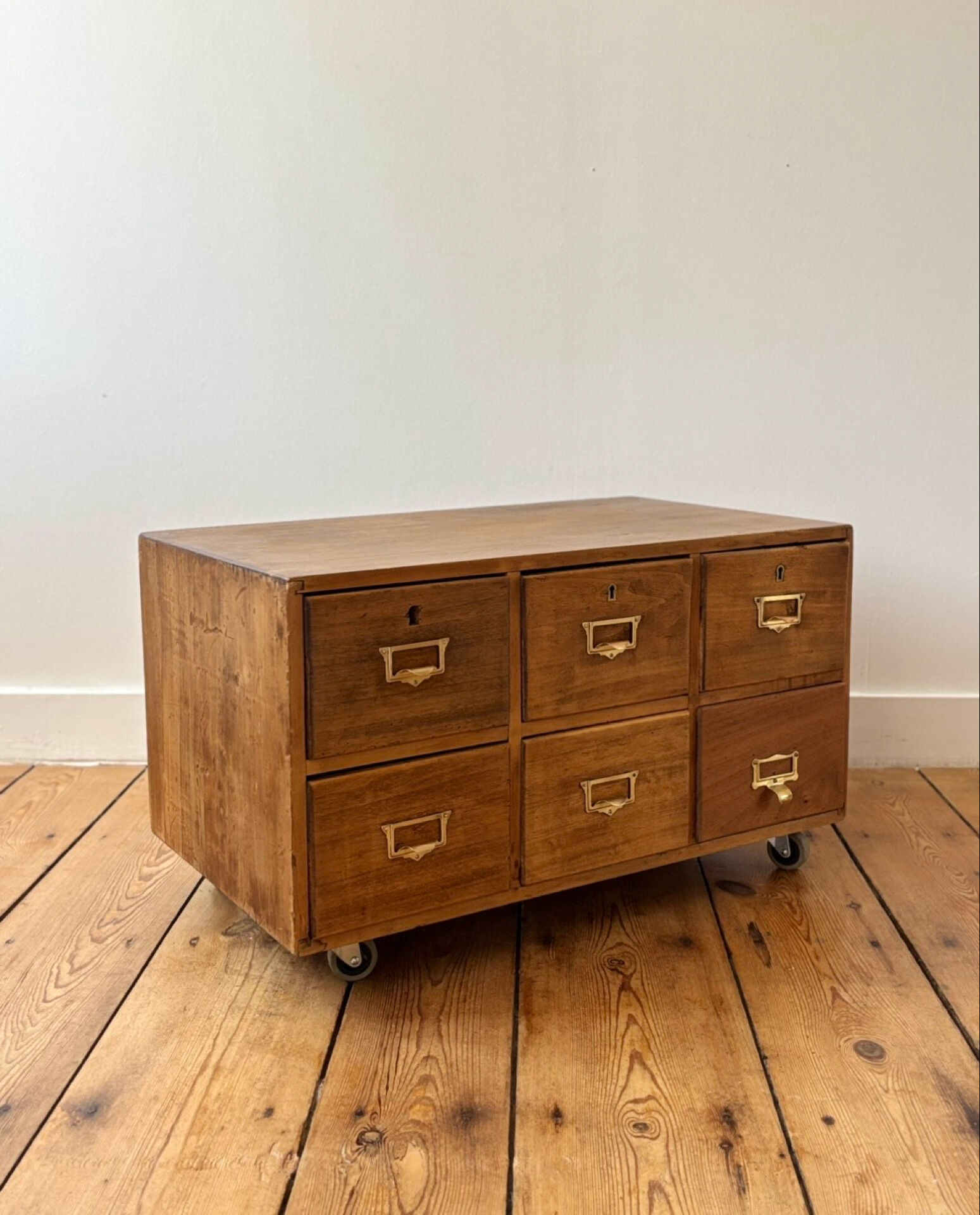 Small antique work cabinet with 6 drawers.