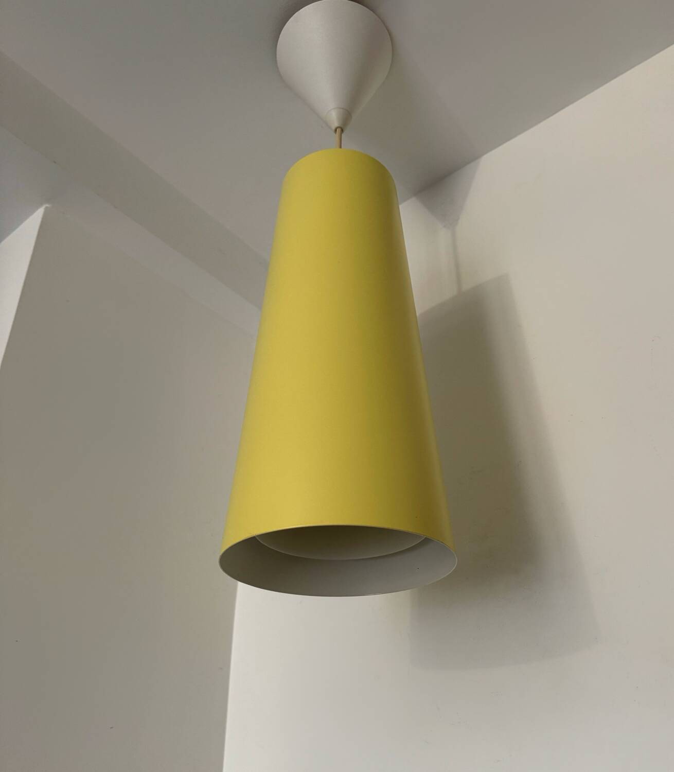 IKEA yellow metal cylindrical pendant light from the 2000s