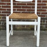 Vintage chair with wicker seat, minimalist design