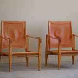 Kaare Klint, a pair of Safari chairs in ash and leather, Rud. Rasmussen, 1960s.
