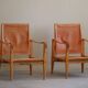 Kaare Klint, a pair of Safari chairs in ash and leather, Rud. Rasmussen, 1960s.