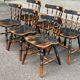 6 solid wood Windsor dining chairs from the 1950s.