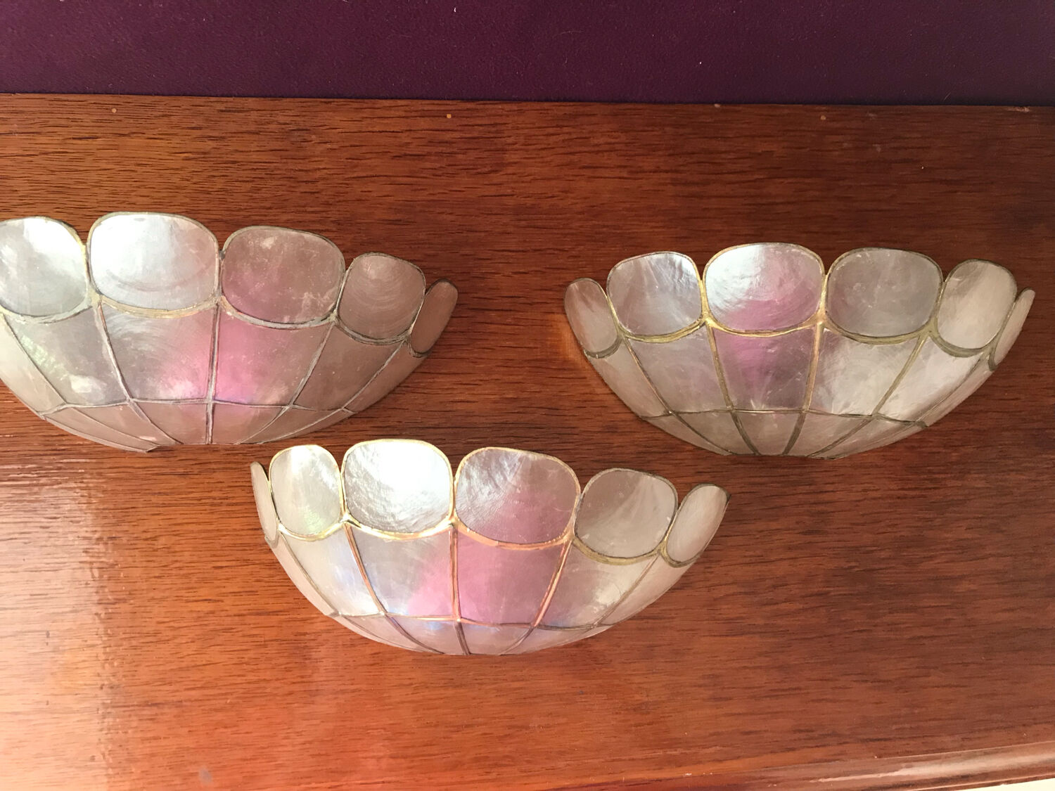 Three mother-of-pearl sconces