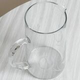 Glass pitcher with decoration of engraved ears of wheat.