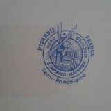 Hollow earthenware dish Saint Amand early twentieth floral decoration