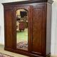 19th-century Victorian English bedroom wardrobe in mahogany.