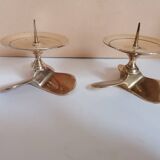 Two brass aviation propeller candle holders