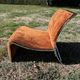 Chrome steel armchair and orange fabric by Vittorio Introini