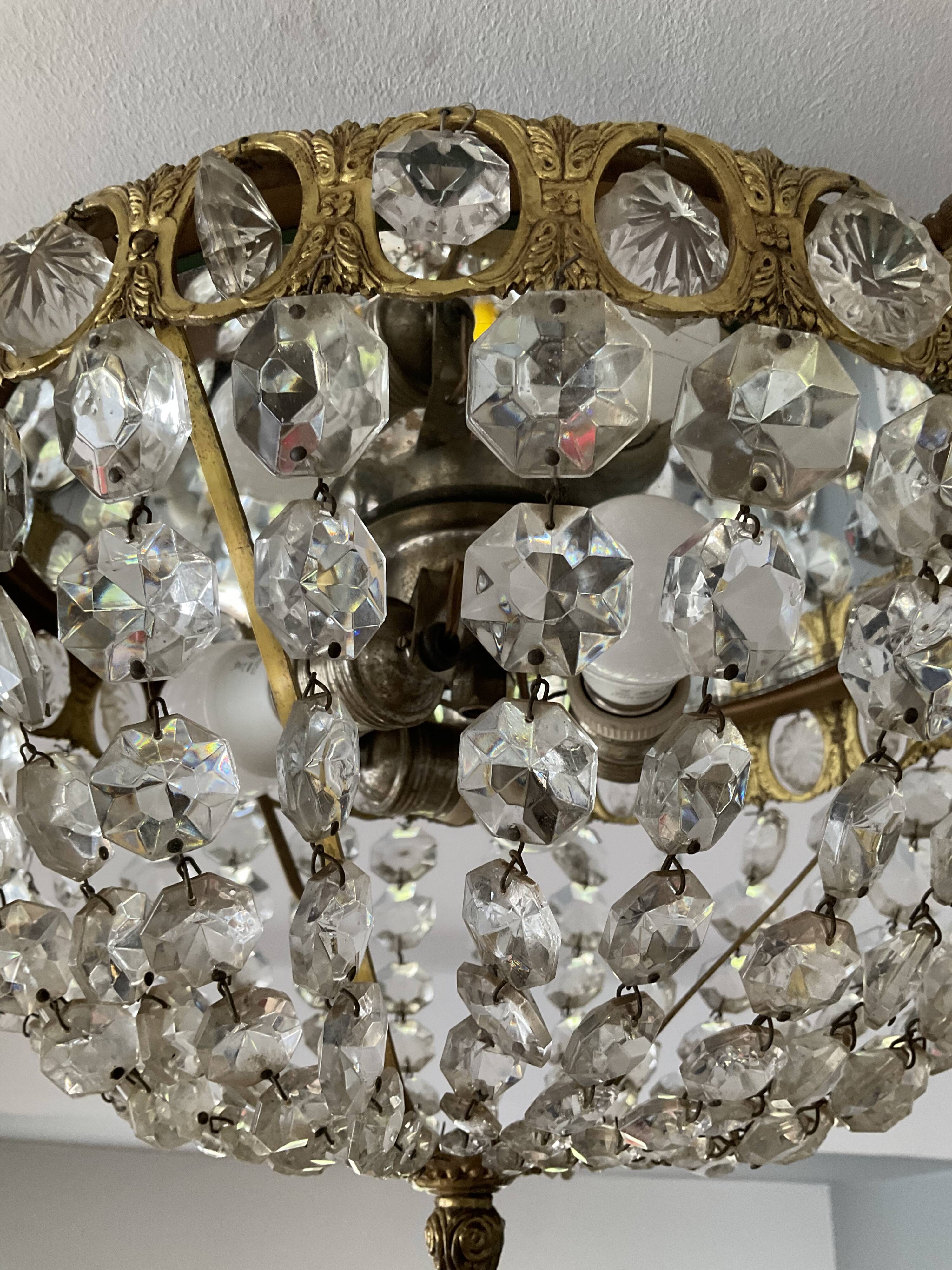 Old ceiling lamp basket in bronze and grapevines