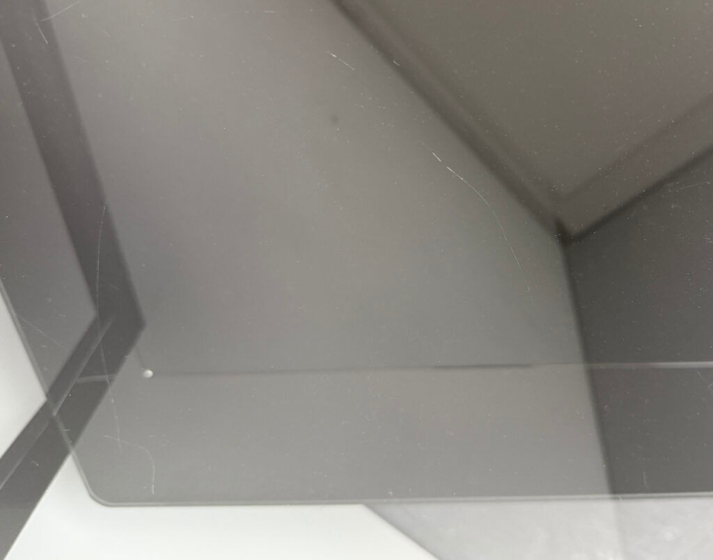 Pair of bedside tables, bedside consoles, black lacquer with glass tops, Italy, 1970s