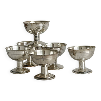 6 dessert bowls on a shiny metal stand.