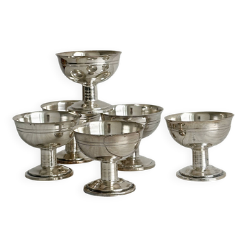 6 dessert bowls on a shiny metal stand.
