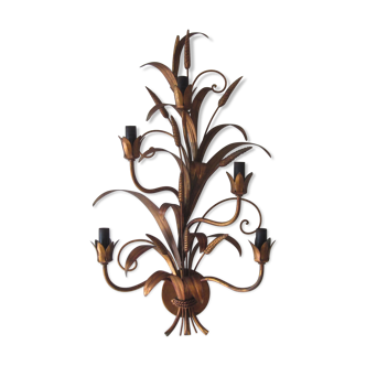 Sconce in gilded metal
