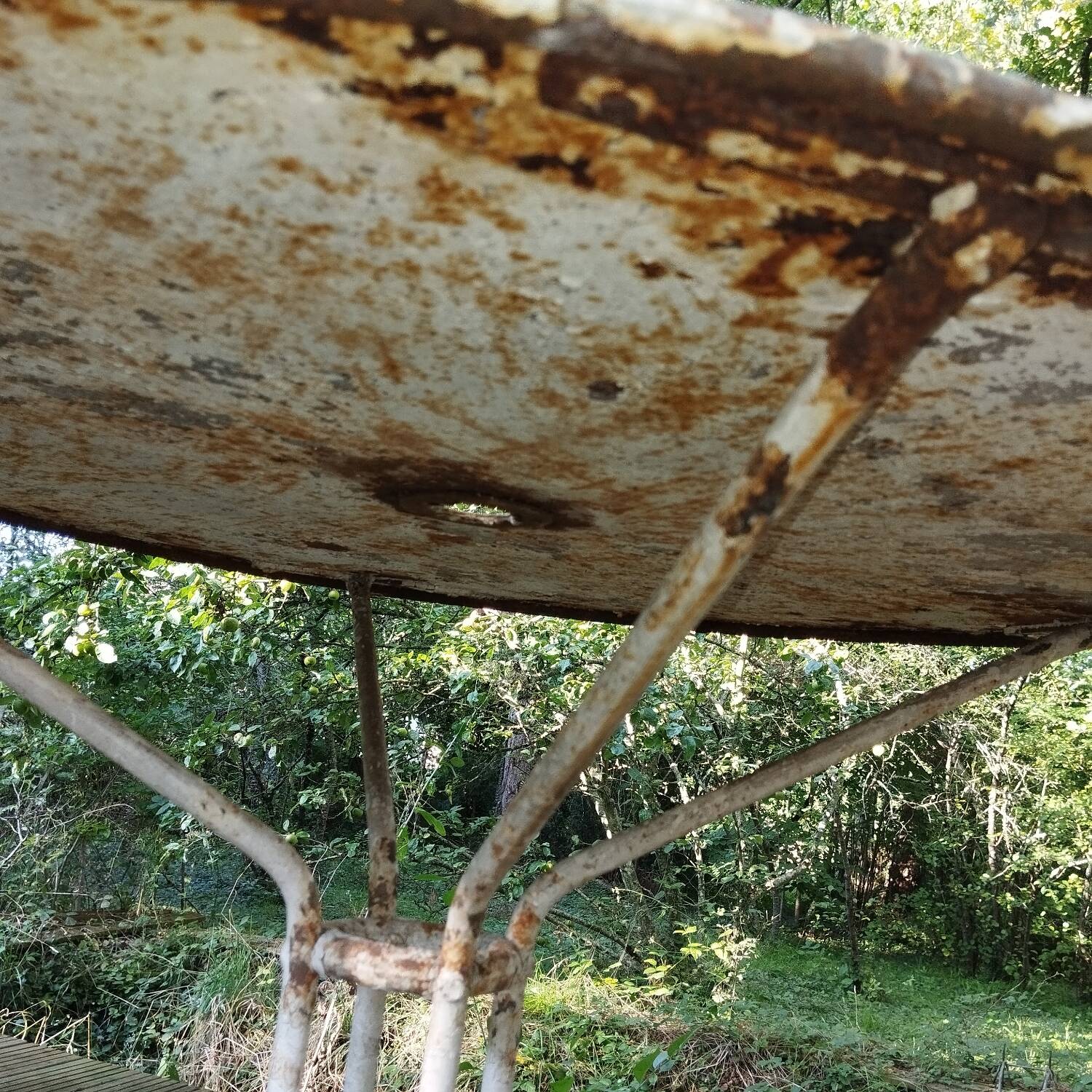 Old cast iron art-deco garden table
