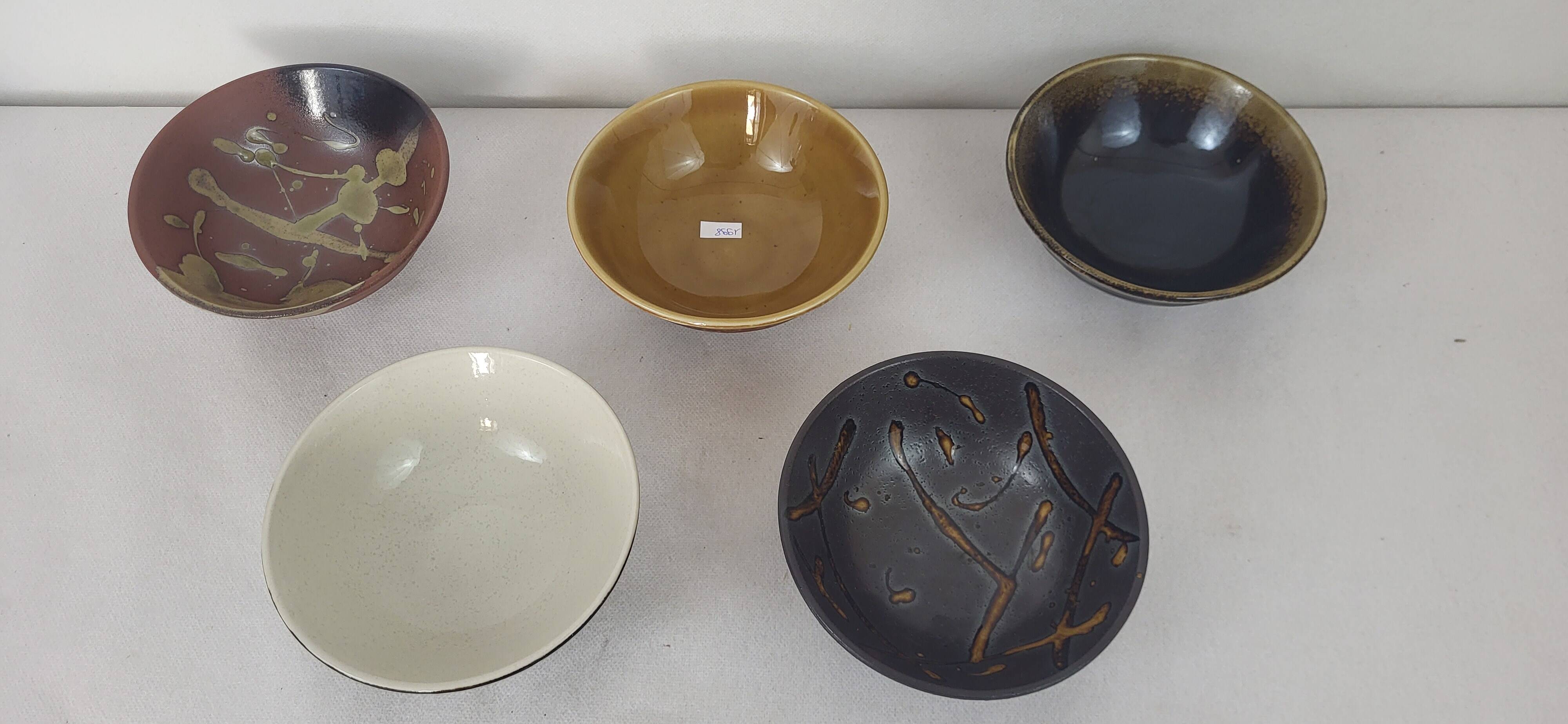 5 stoneware bowls on heels