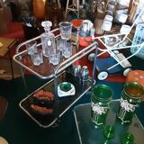 Dessert, bar, glass and chrome on roulette year 70