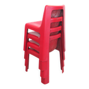 Four red fibreglass chairs from the 1970s.