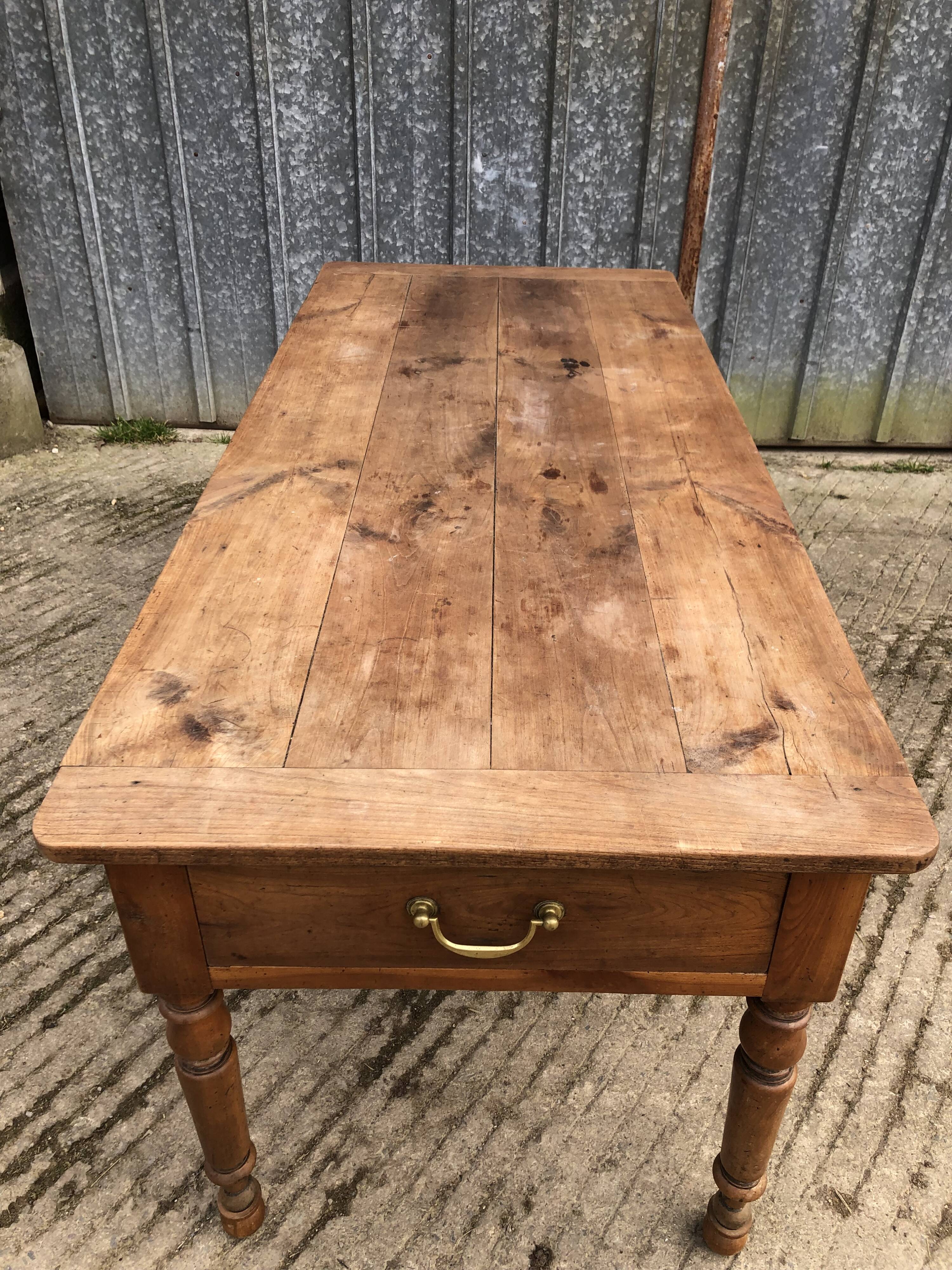 Antique cherry farmhouse table with 2 drawers and 1 pull-out