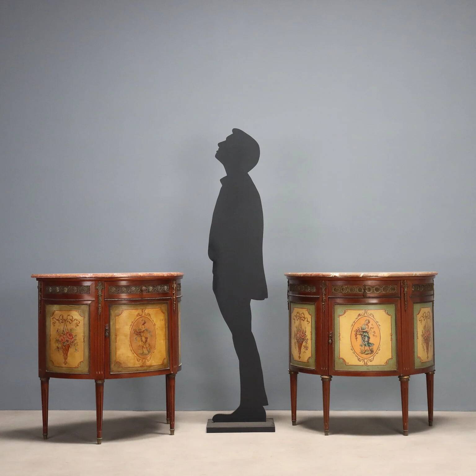 Antique demi-lune buffets in neoclassical style in mahogany from the 20th century.