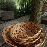 Set of three old rattan baskets