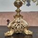 Antique candle holder in bronze and brass nineteenth century.