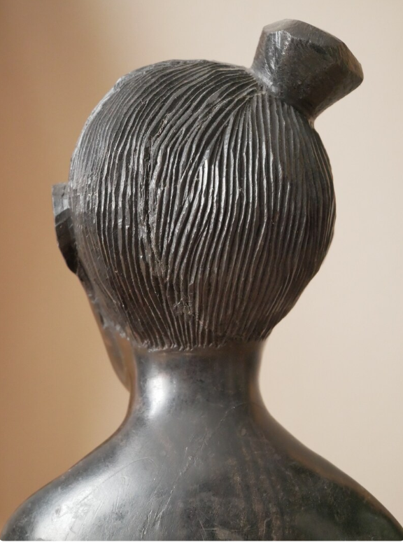 Bust of a woman in ebony African Art