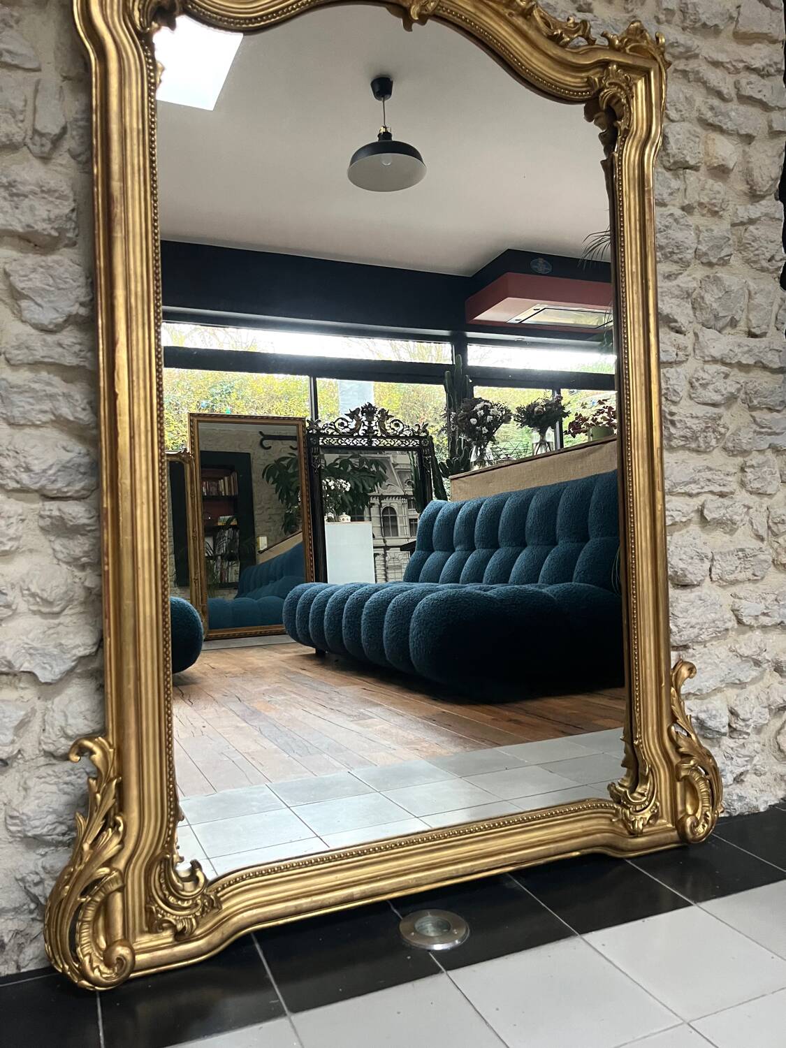 Antique mirror 169/105cm with pediments and pearl detailing in gold leaf.