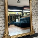 Antique mirror 169/105cm with pediments and pearl detailing in gold leaf.