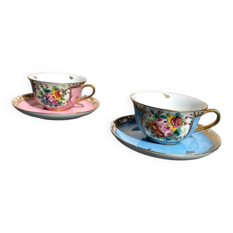 Duo of limoges porcelain cups and saucers with blue and pink floral decoration