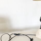 Sculptural lamp in metal and stone