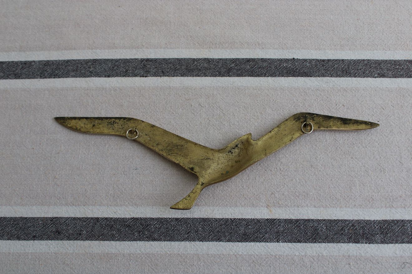 Brass wall decoration element