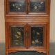 Antique Chinese armoire hand-carved around 1880 with country-style handles.
