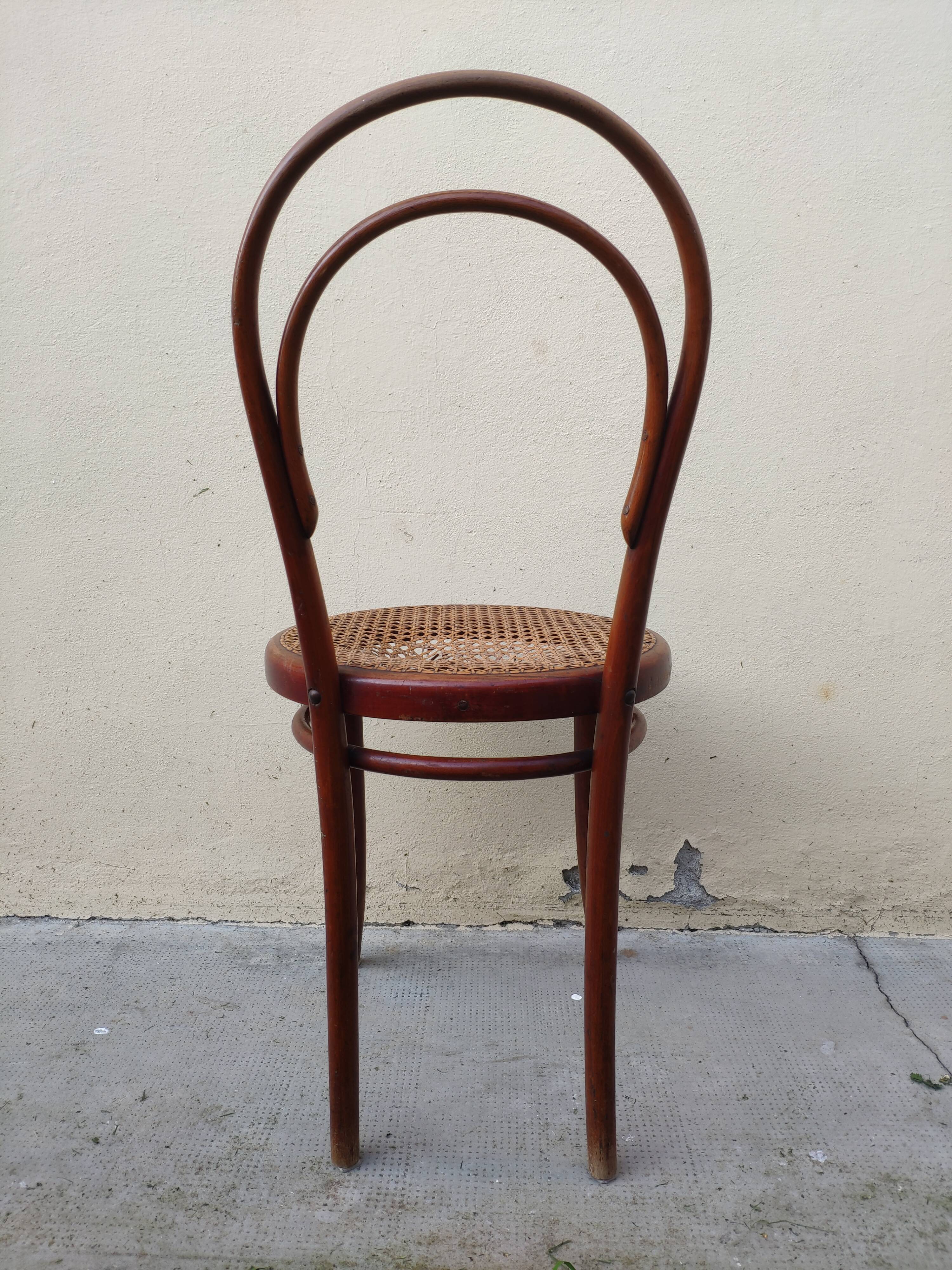 Pair of chairs Thonet n.  14 from 1861-1865, marked with a 1A label and a sun print