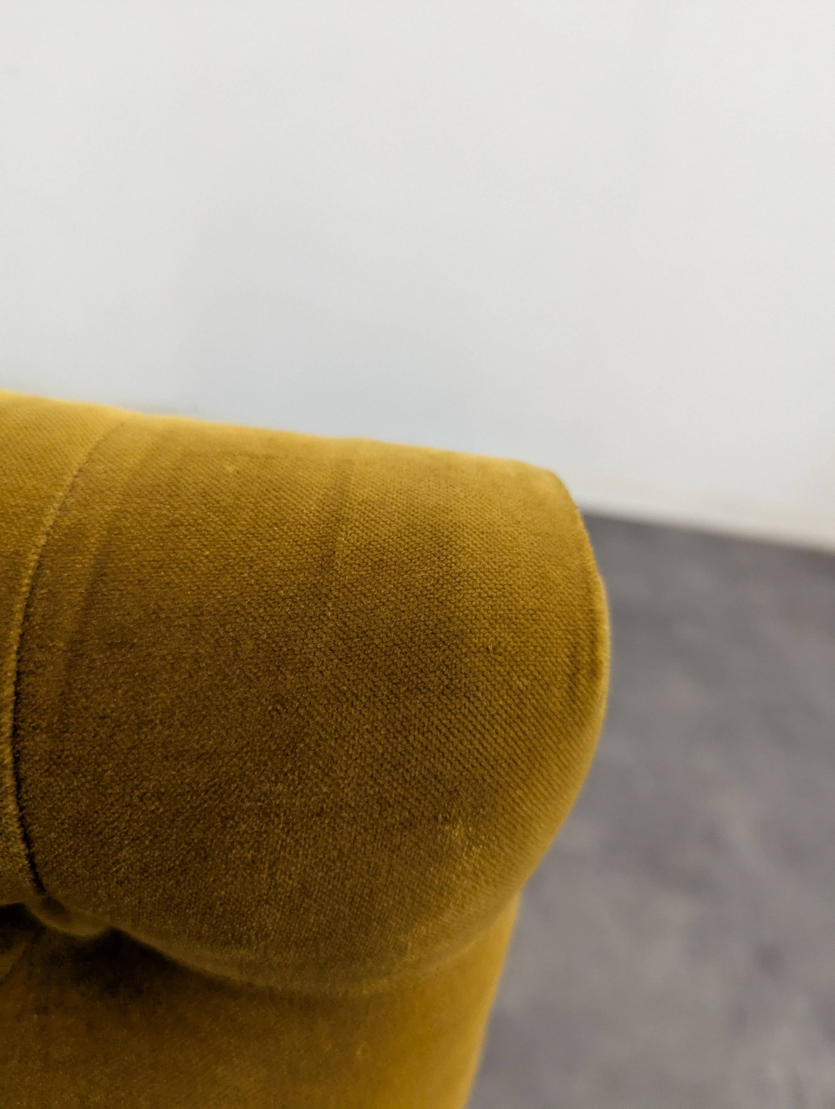 Saffron-colored velvet sofa