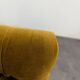 Saffron-colored velvet sofa