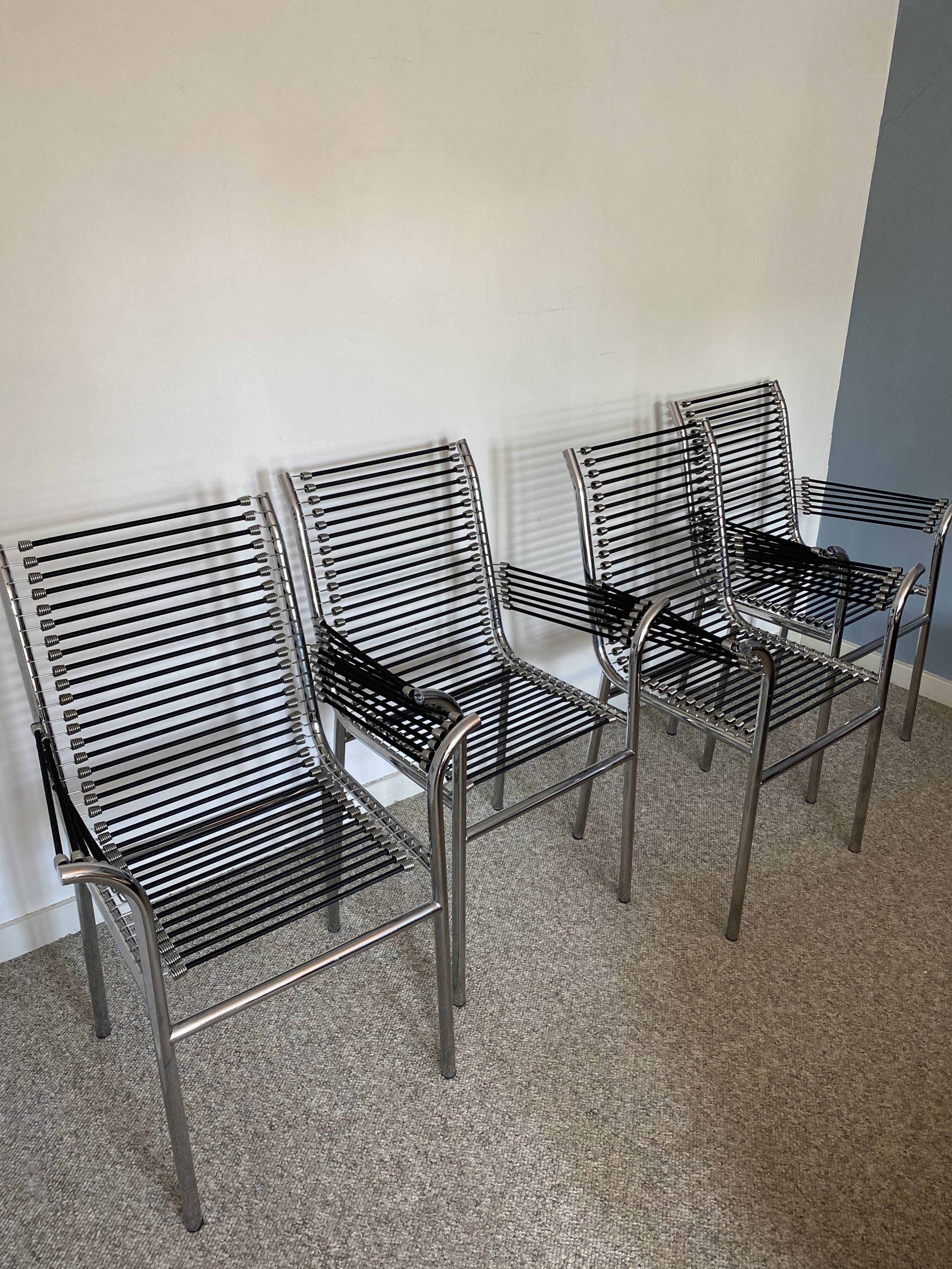 Set of 4 ‘bungee’ lounge chairs